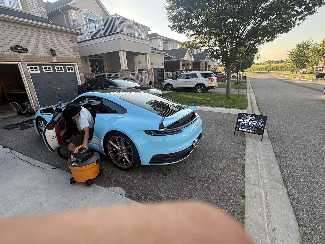 Interior detailing a Porsche 911 at a customer's Milton home